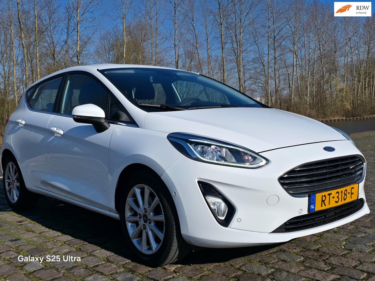 Ford Fiesta - 1.0 EcoBoost Titanium start stop parkeer sensor carplay achteruit camera cruis control sto - AutoWereld.nl