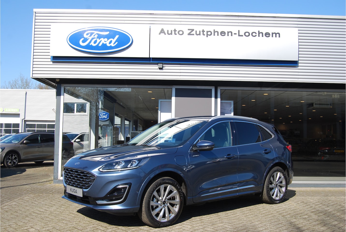 Ford Kuga - 2.5 PHEV Vignale 225PK I ADAP CRUISE I LED MATRIX I 19" INCH I WINTER PACK I  BLIS I B&O A - AutoWereld.nl