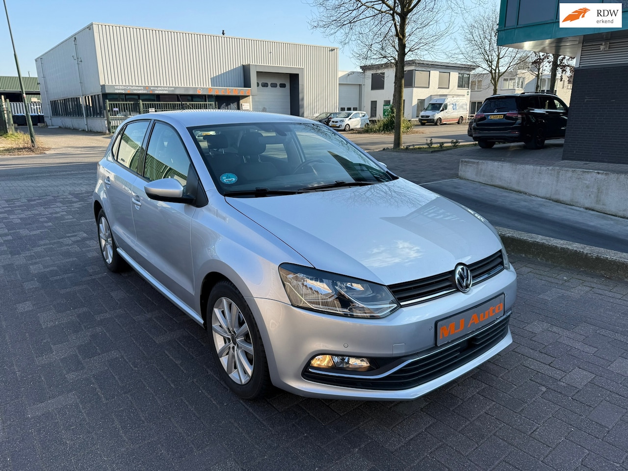 Volkswagen Polo - 1.2 TSI Comfortline 5drs airco cruise control - AutoWereld.nl