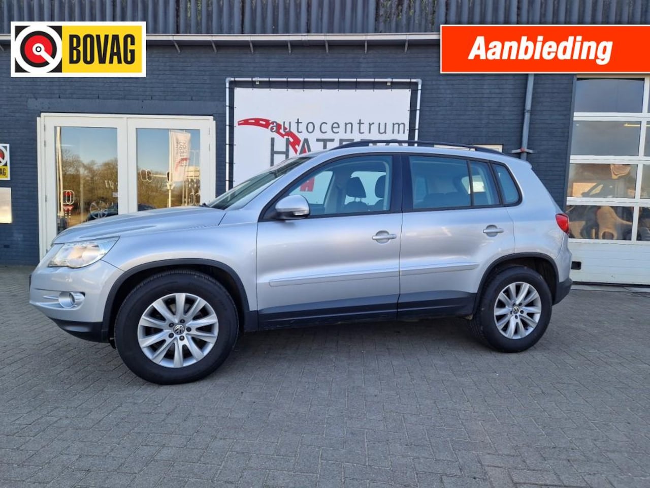 Volkswagen Tiguan - 1.4 TSI Comfort en Design 4 Motion ECC Cruise Meeneemprijs - AutoWereld.nl