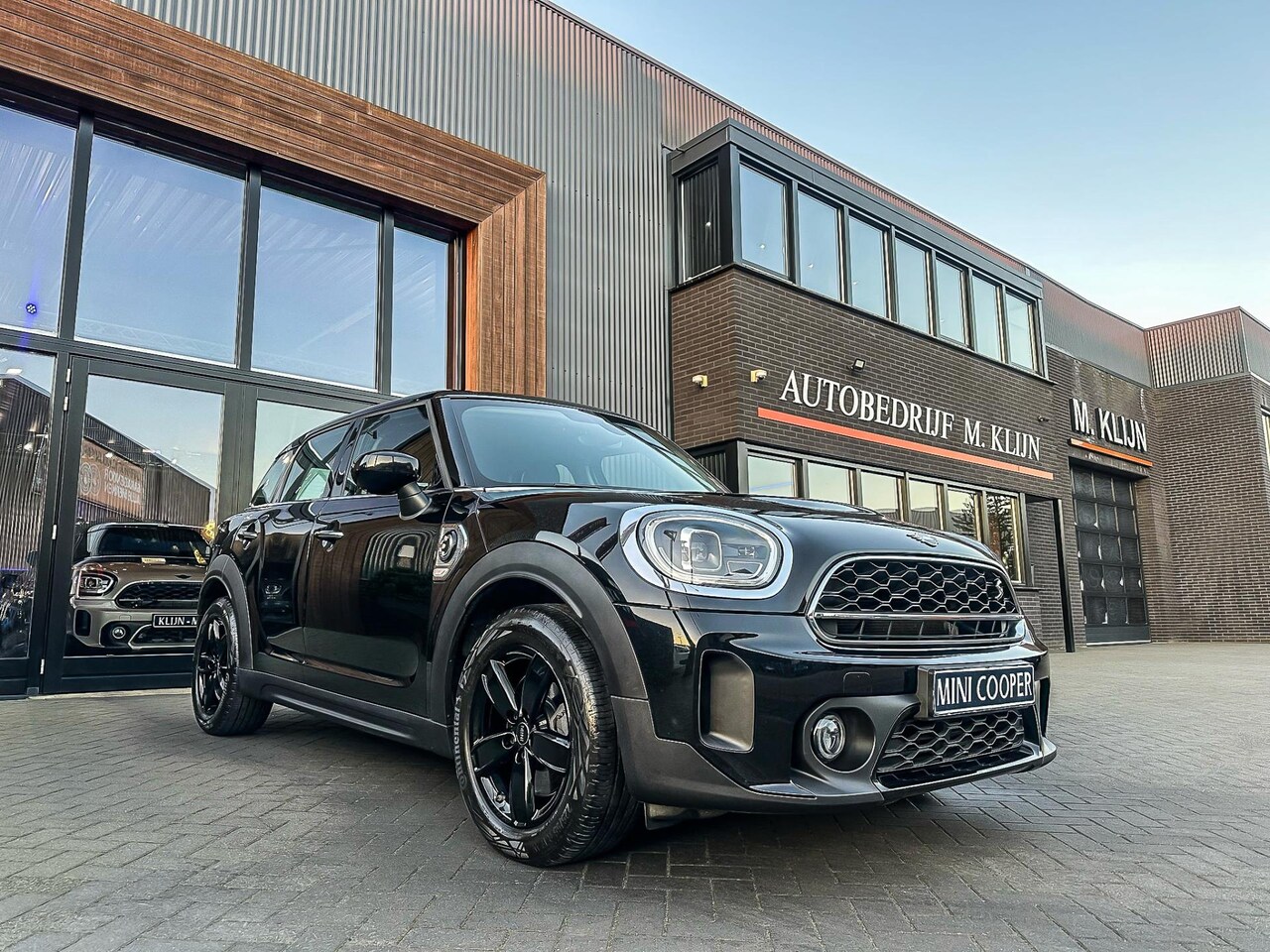 MINI Countryman - Mini 2.0 Cooper S E ALL4 Essential 220pk/nw model/led/navi/btw - AutoWereld.nl