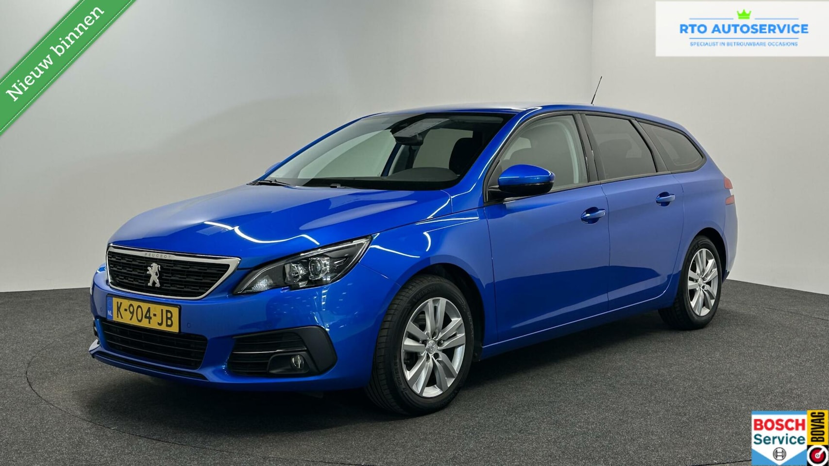 Peugeot 308 SW - 1.2 PureTech Blue Lease Active NAVI TREKHAAK - AutoWereld.nl