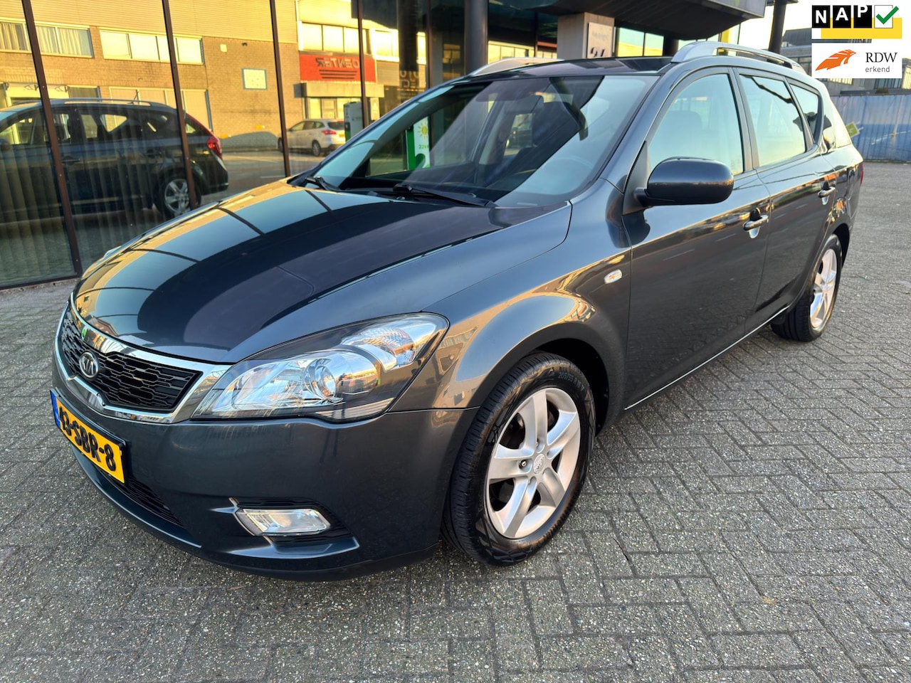 Kia Cee'd Sporty Wagon - 1.4 CVVT Seven / / Airco / Navi - AutoWereld.nl