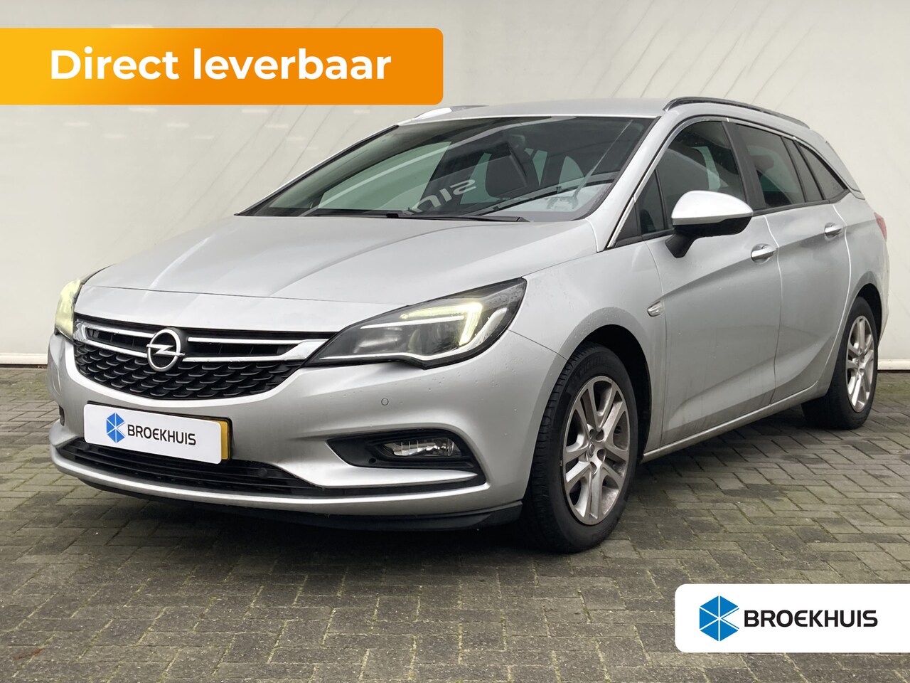 Opel Astra Sports Tourer - Sports Tourer 1.0 Turbo Online Edition | Airco | Cruise | Navi | Pdc V&A | Trekhaak | Clim - AutoWereld.nl