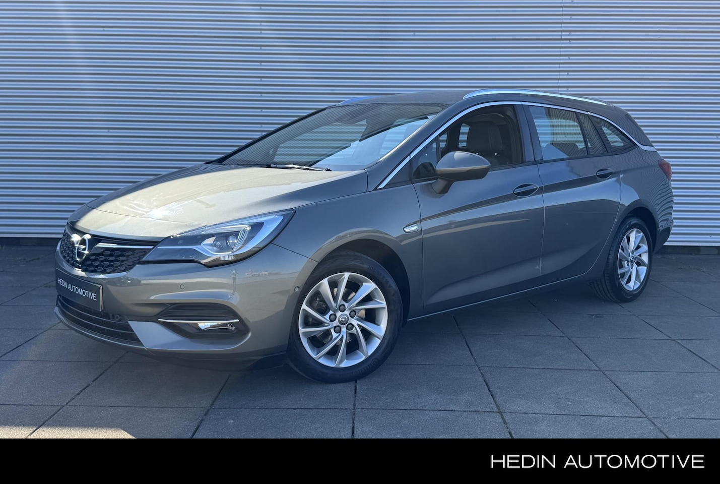 Opel Astra Sports Tourer - 1.2 Elegance | Camera | Navigatie | Cruise Control | Automatische achterklep | - AutoWereld.nl