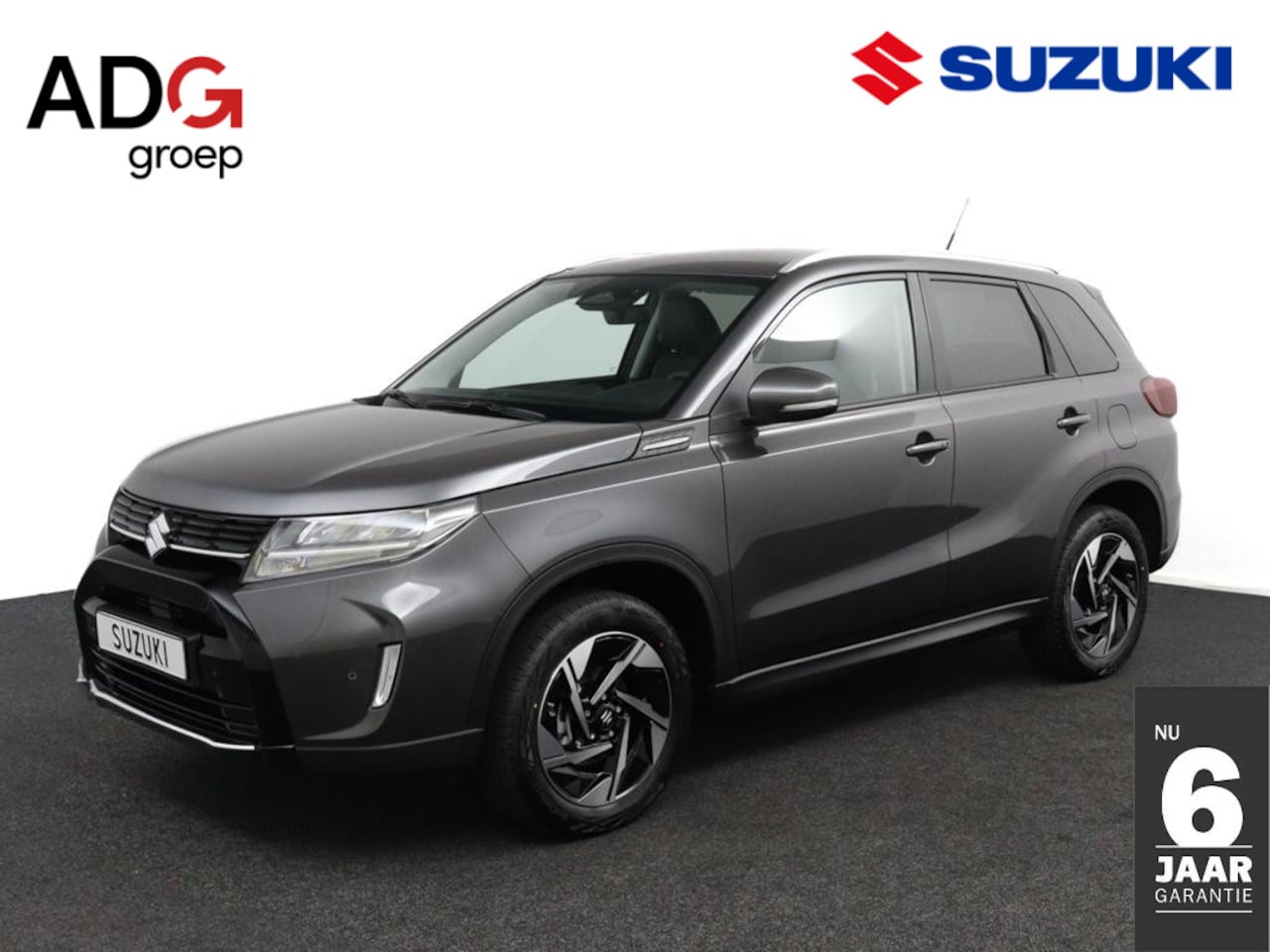 Suzuki Vitara - 1.5 Hybrid Style | Nieuwe Auto | Lederen/ Stof bekleding | Automatisch inklapbare Buitensp - AutoWereld.nl