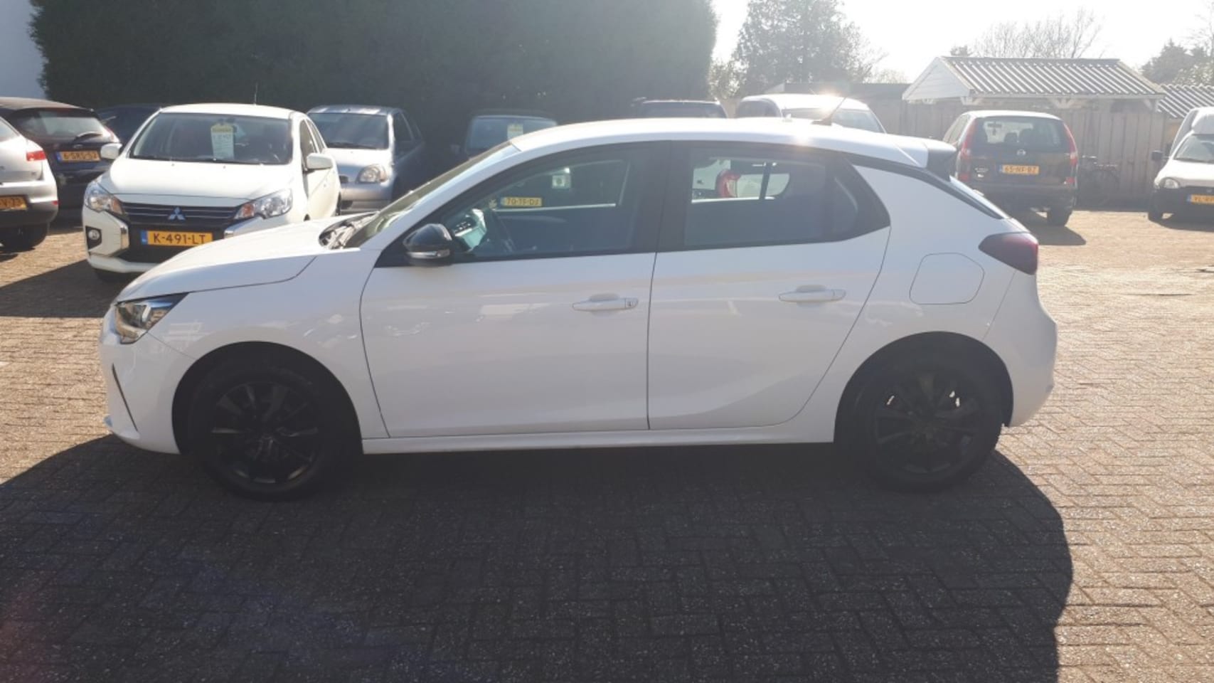 Opel Corsa - 1.2 Edition RADIO/AIRCO/NAVI/CRUISE/ELEC.SPIEGELS+RAMEN VOOR