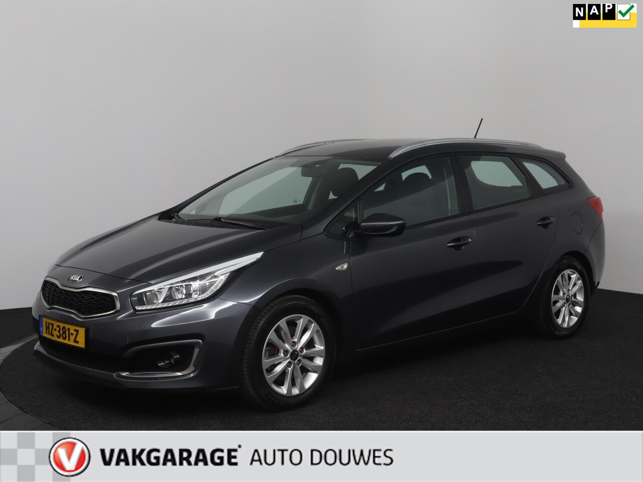 Kia Cee'd Sportswagon - 1.6 GDI First Edition | NAP | Lage KM's! | Navigatie | Airco | Bluetooth | - AutoWereld.nl