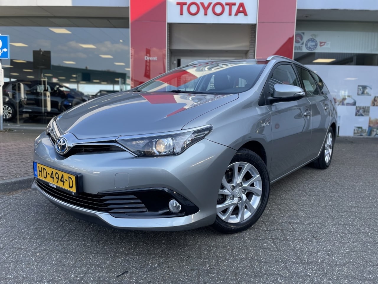 Toyota Auris Touring Sports - 1.8 Hybrid Aspiration | Cruise control | Navi | Elektr. verst. b - AutoWereld.nl