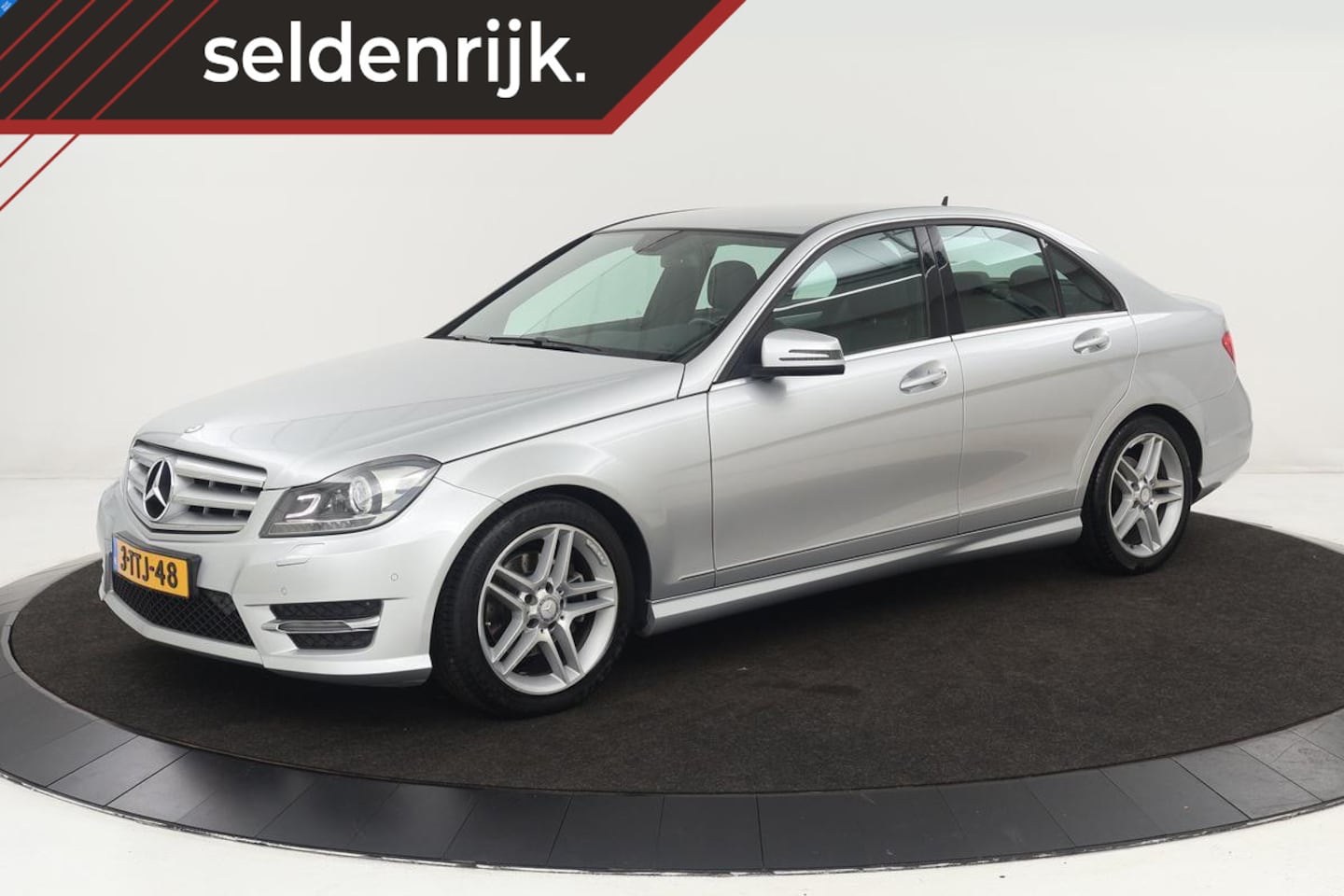 Mercedes-Benz C-klasse - 180 AMG Sport | Stoelverwarming | Xenon | Half leder | Navigatie | Climate control | Park - AutoWereld.nl