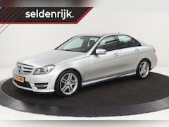 Mercedes-Benz C-klasse - 180 AMG Sport | Stoelverwarming | Xenon | Half leder | Navigatie | Climate control | Park