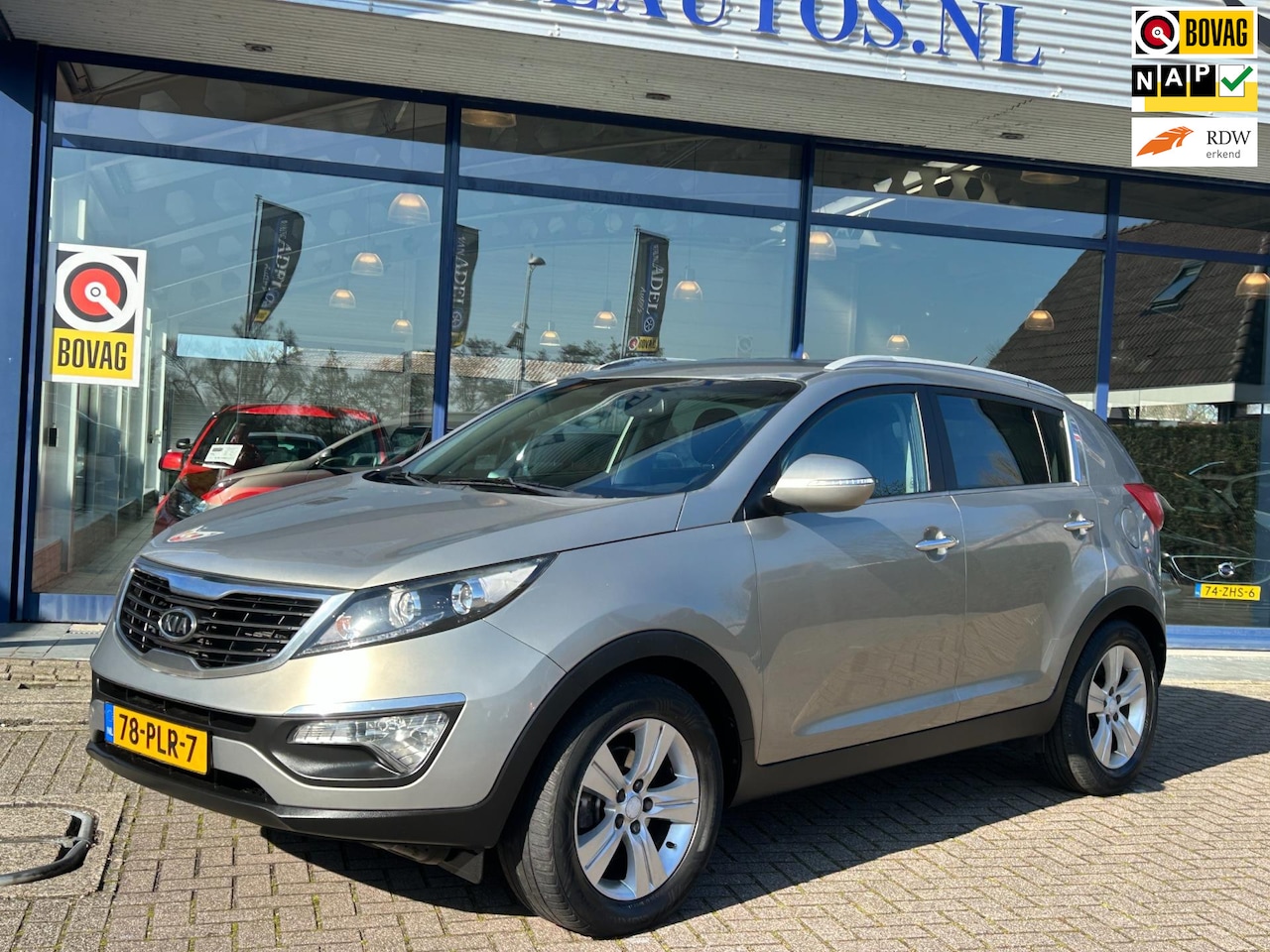 Kia Sportage - 2.0 X-ecutive Plus Pack Aut. Half Leer Navi Clima Cruise Park.Sens Trekhaak NAP NL-Auto De - AutoWereld.nl