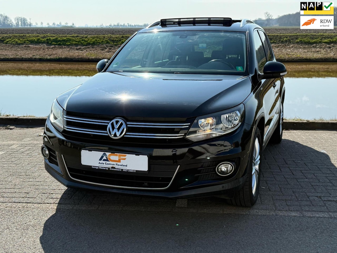 Volkswagen Tiguan - 1.4 TSI Sport&Style CUP EDITION PANO / DSG / NAVI - AutoWereld.nl