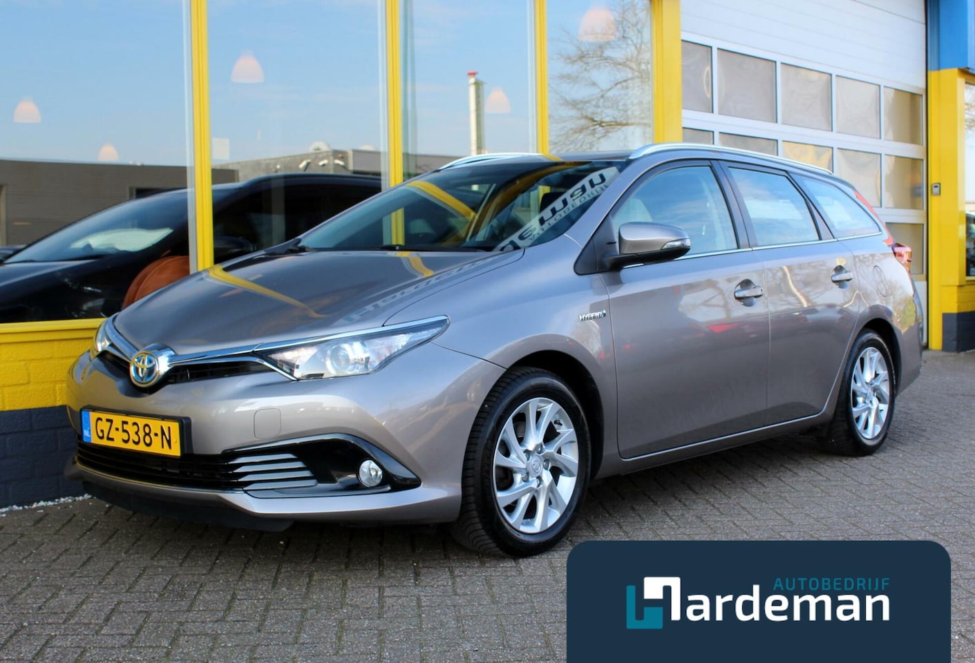 Toyota Auris - 1.8 Hybrid Comfort Navi Trekhaak - AutoWereld.nl