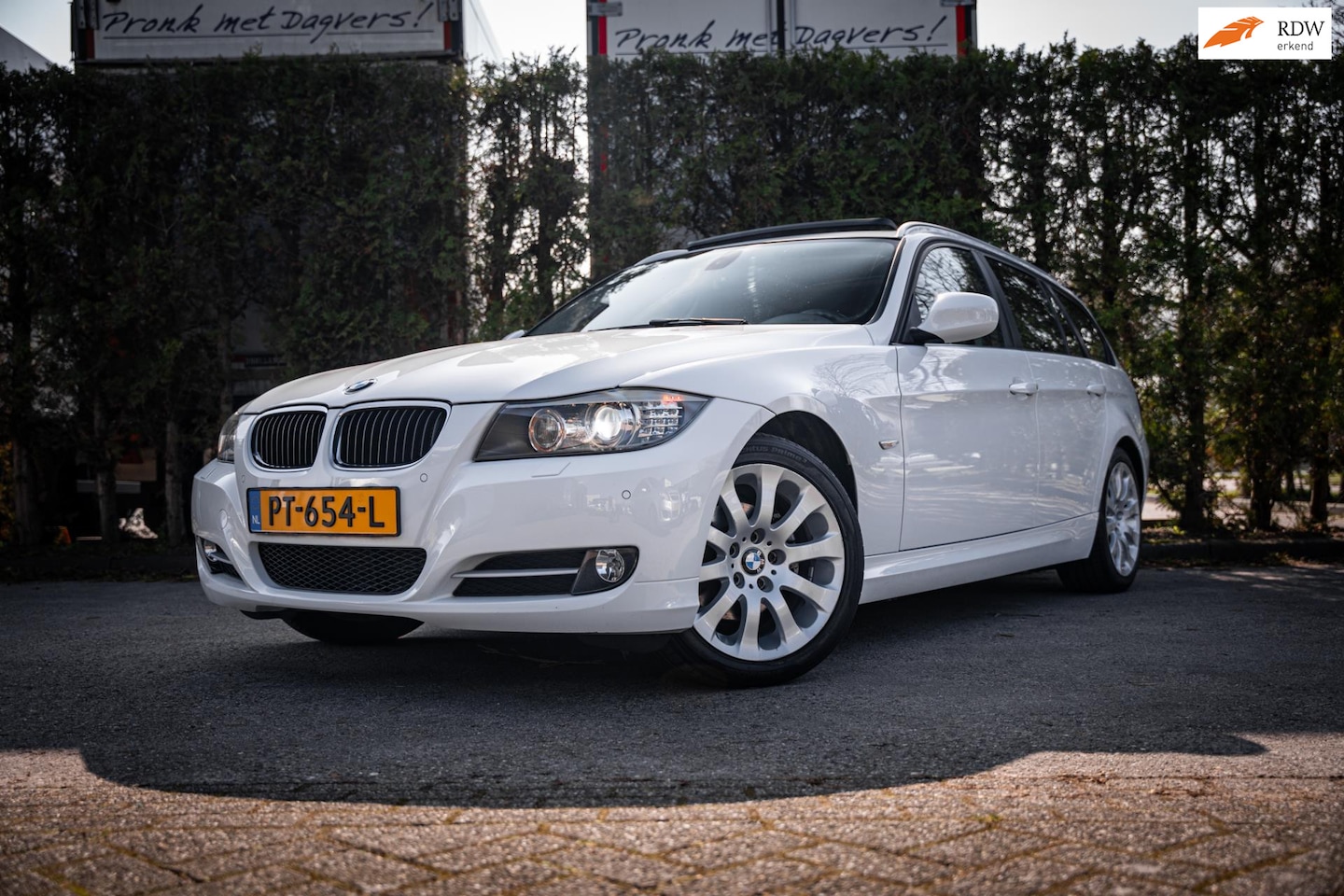 BMW 3-serie Touring - 318i LCI High Executive - AutoWereld.nl