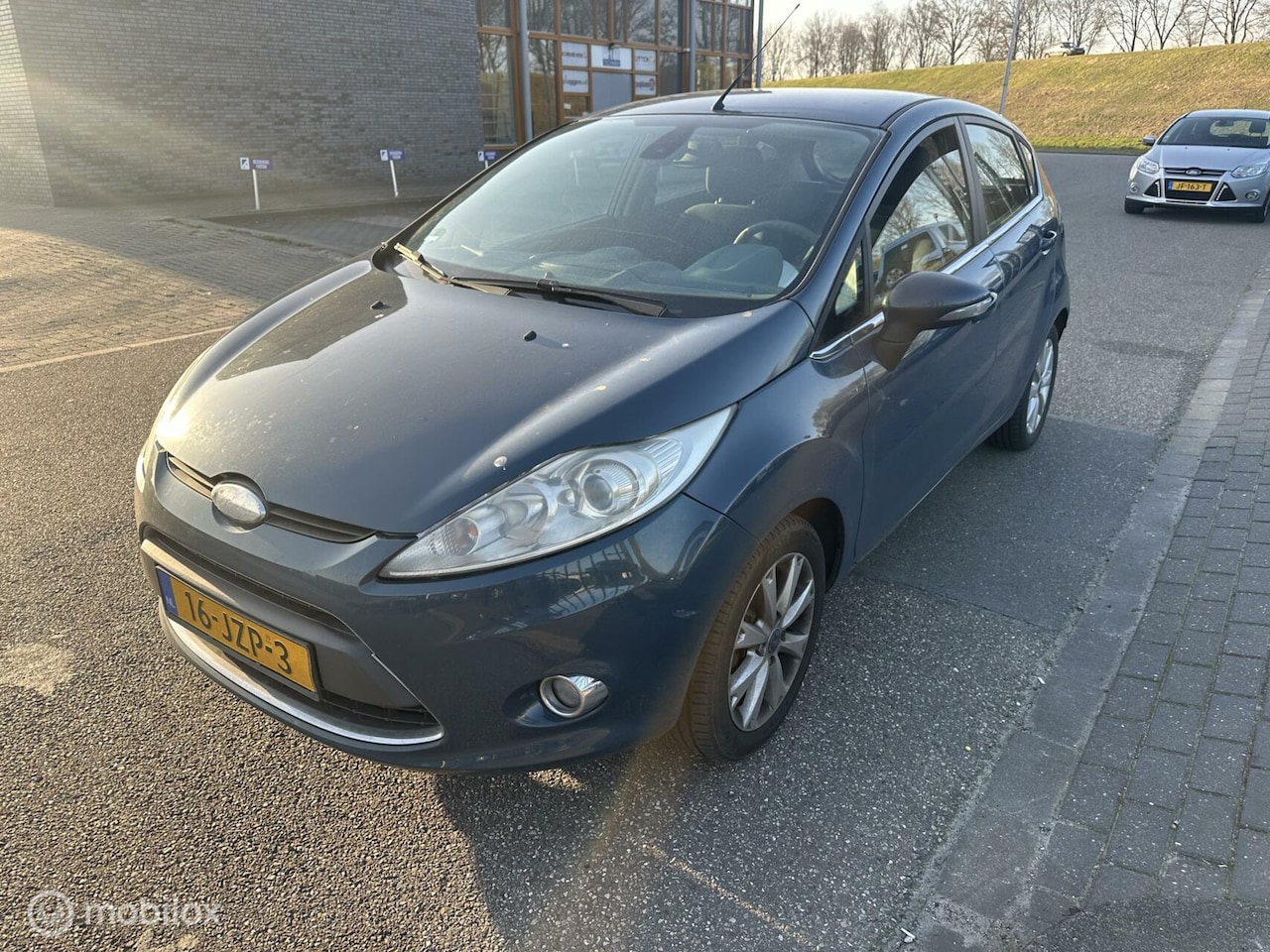 Ford Fiesta - 1.25 Ghia 1.25 Ghia - AutoWereld.nl