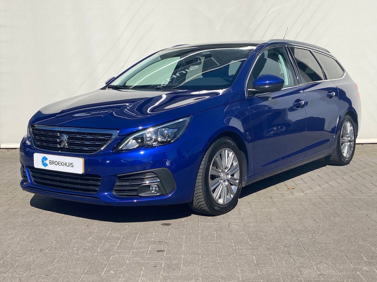 Peugeot 308 SW - 1.2 PureTech Blue Lease Premium Trekhaak| lederbekledeing | Massagestoe| Panoramadak - AutoWereld.nl