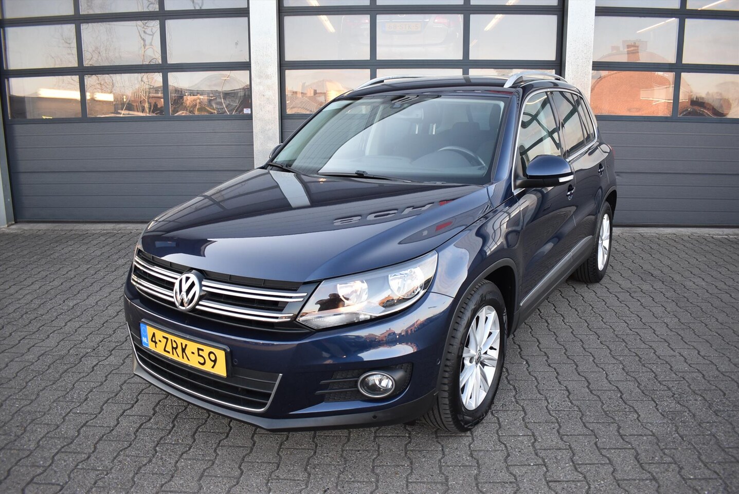 Volkswagen Tiguan - 1.4 TSI 160pk BMT Sport & Style - AutoWereld.nl