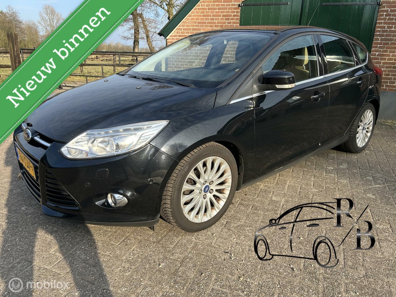 Ford Focus - 1.0 EcoBoost Titanium LEER/NAVI/STOELVERW/ - AutoWereld.nl