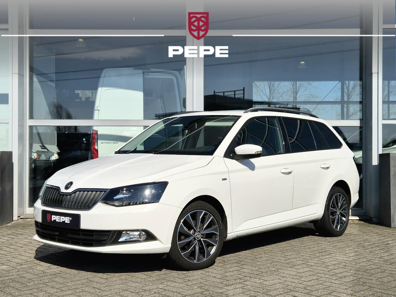 Skoda Fabia Combi - 1.2 TSI Drive|CC|NAVI - AutoWereld.nl