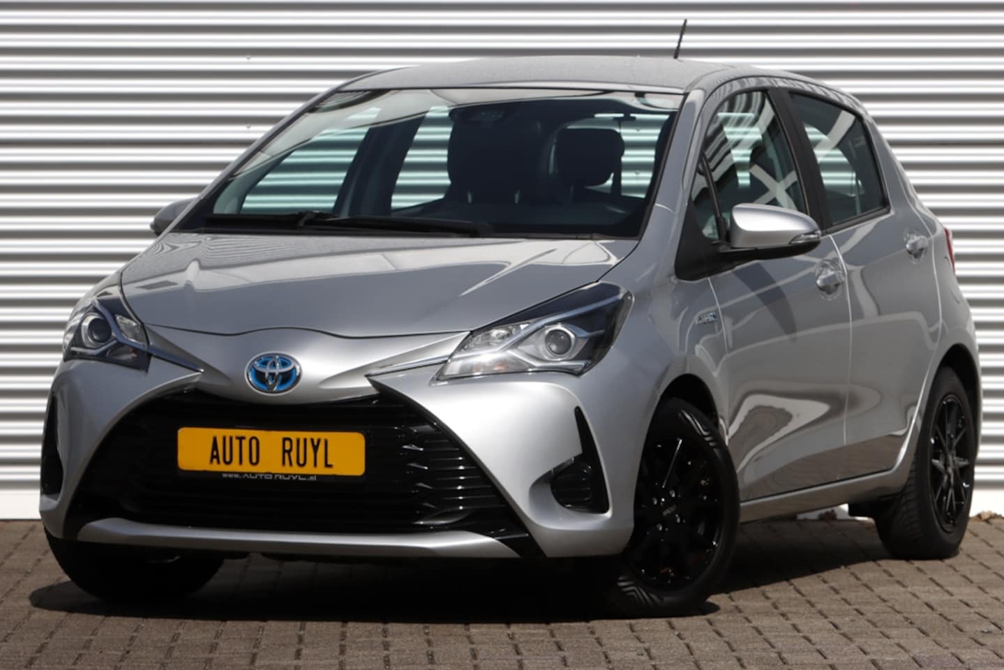 Toyota Yaris - 1.5 Hybrid Active Navi / Camera / Sportv. - AutoWereld.nl