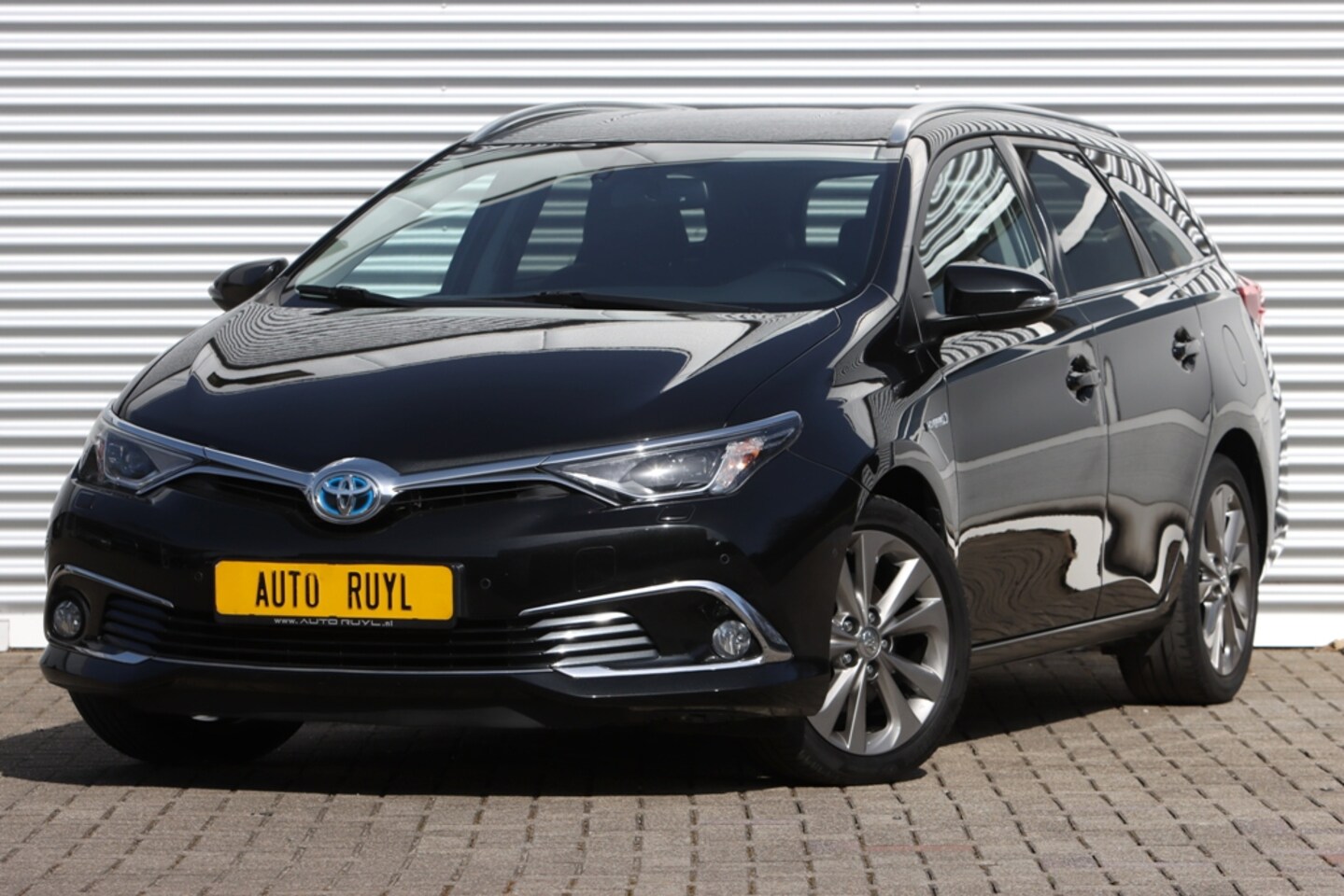 Toyota Auris Touring Sports - 1.8 Hybrid Executive Navi / Xenon - AutoWereld.nl