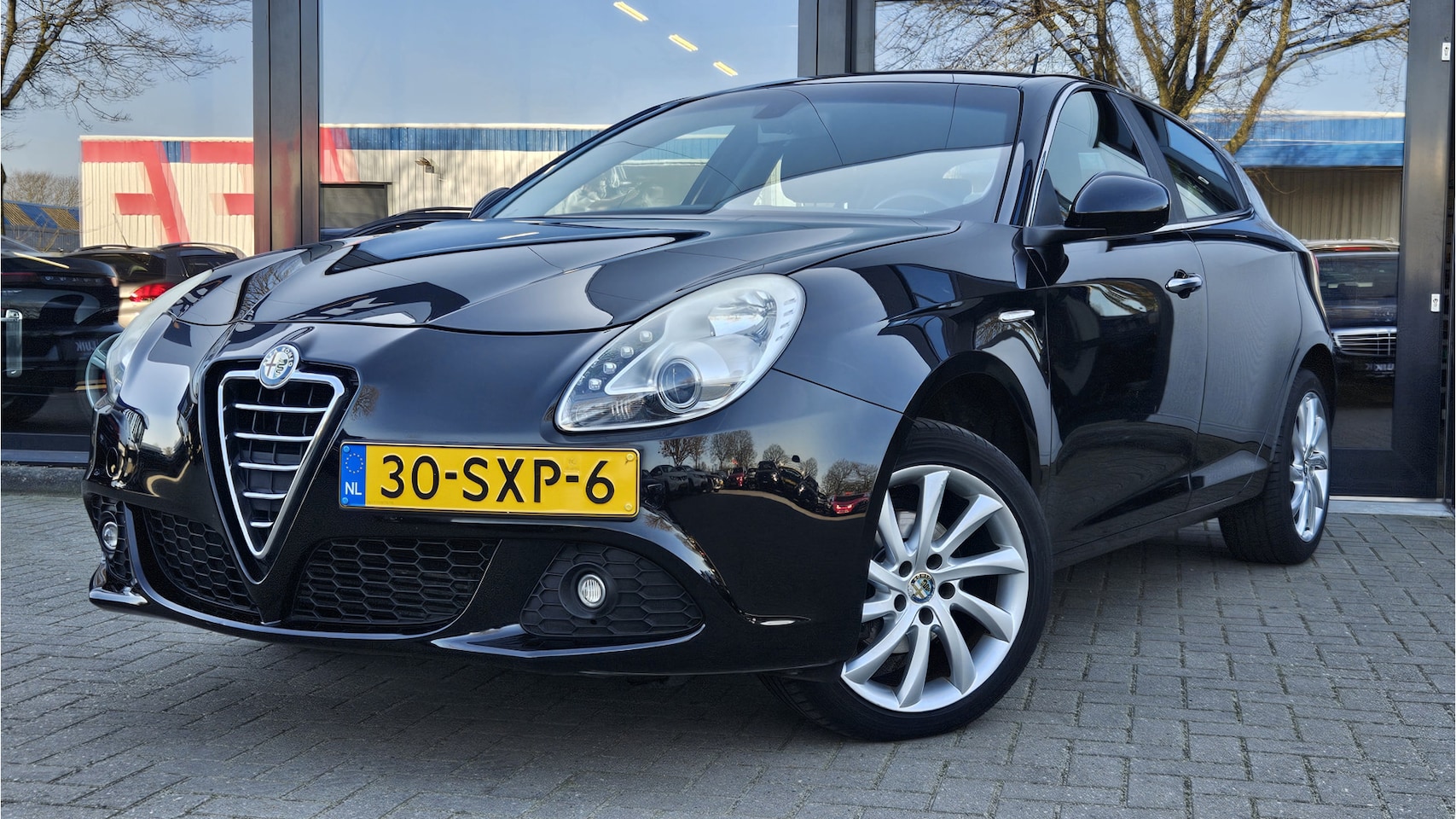 Alfa Romeo Giulietta - 1.4 T Distinctive + NAVI + CRUISE + LM VELGEN - AutoWereld.nl