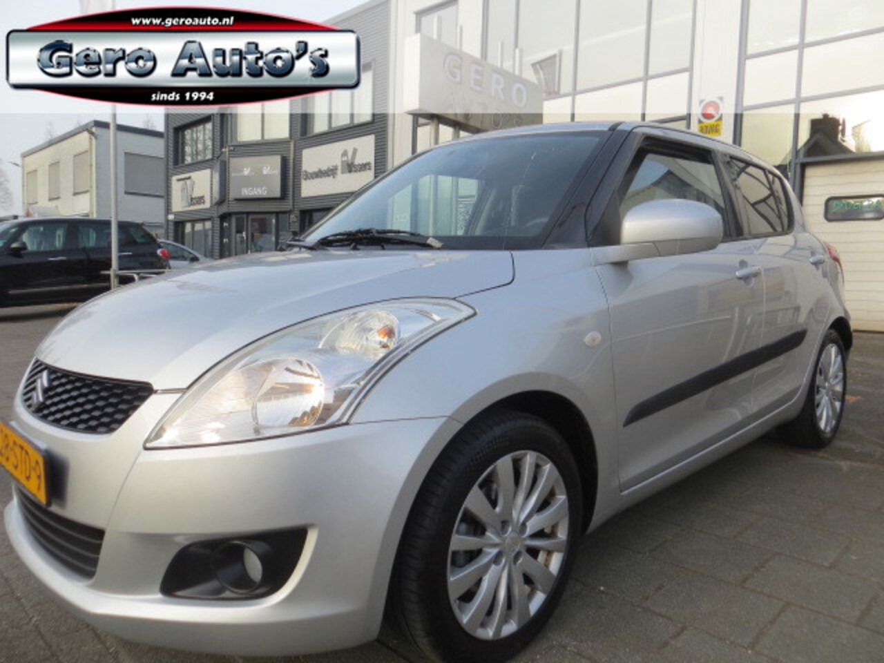 Suzuki Swift - 1.2 Exclusive EASSS 5 deurs nl-auto airco ecc bleutooth lmv cr control  etc - AutoWereld.nl