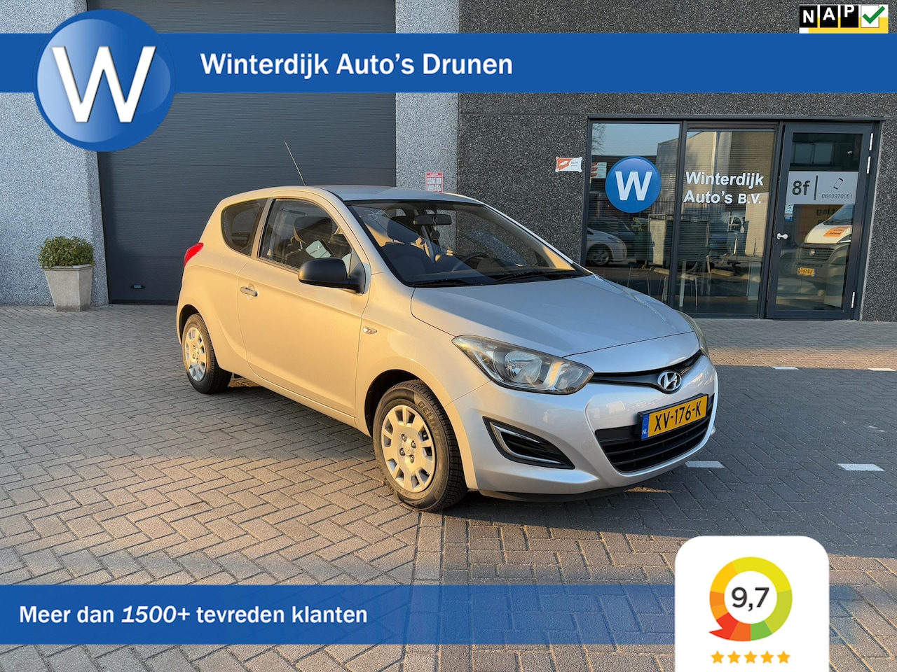 Hyundai i20 - 1.2i i-Drive Airco 6 Maanden Garantie Rijklaar - AutoWereld.nl