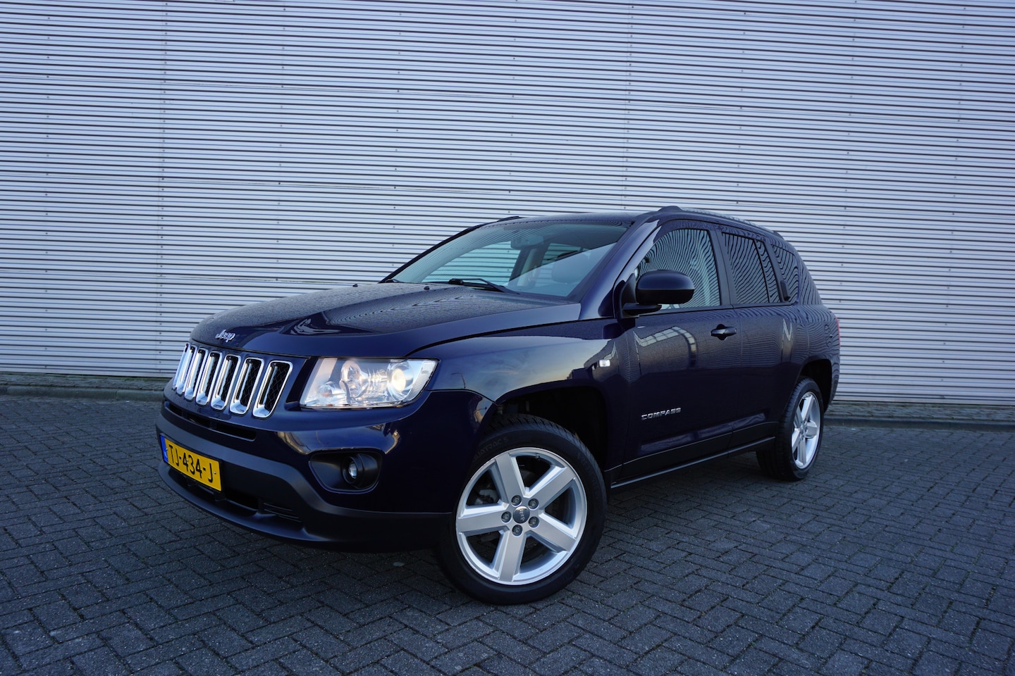 Jeep Compass - 2.4 Limited 4WD AUTOMAAT Airco / Navi / Cruise / Elektr. ramen / Trekhaak - AutoWereld.nl