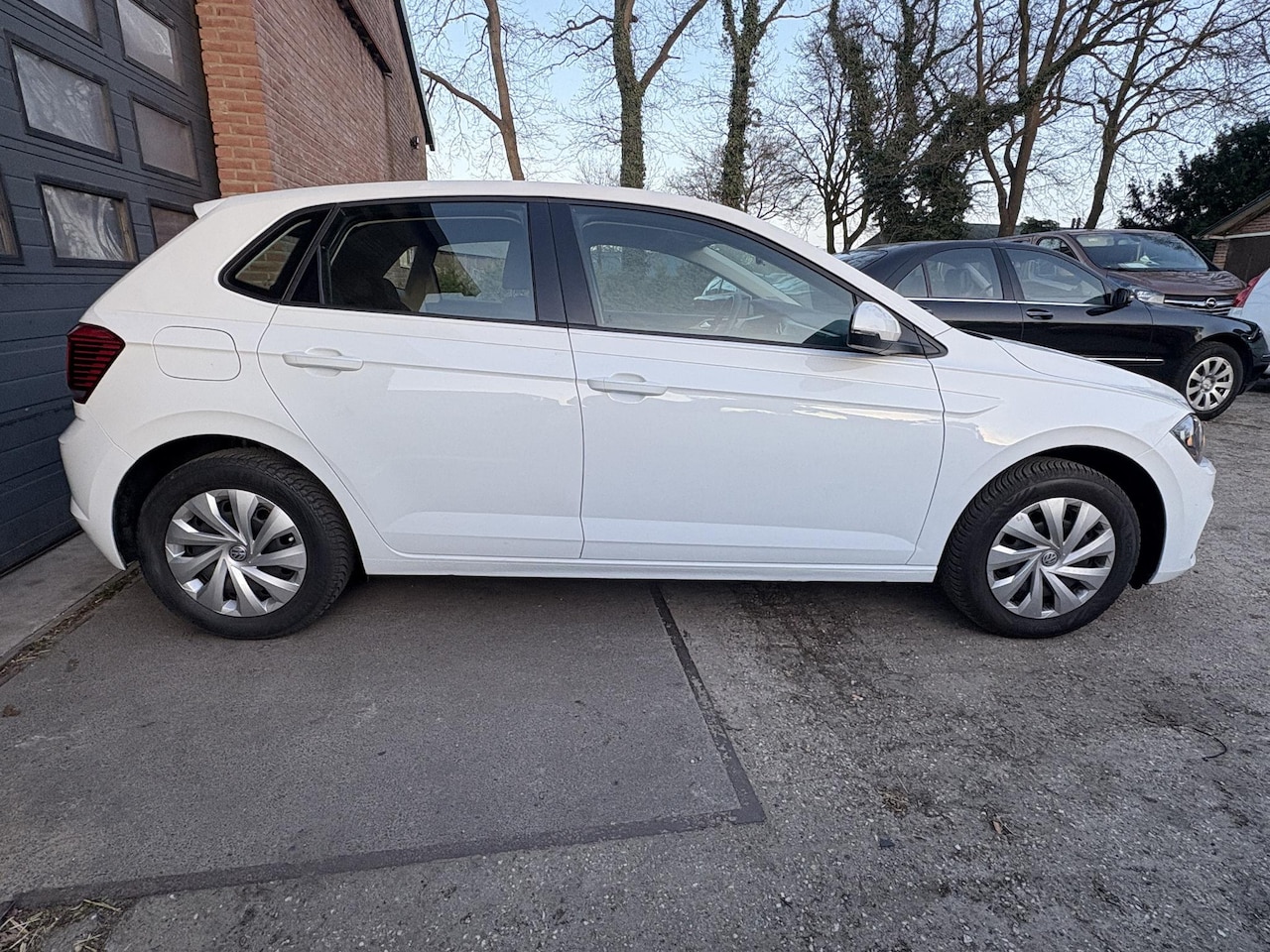 Volkswagen Polo - 1.0 MPI Airco/Navi/Carplay - AutoWereld.nl