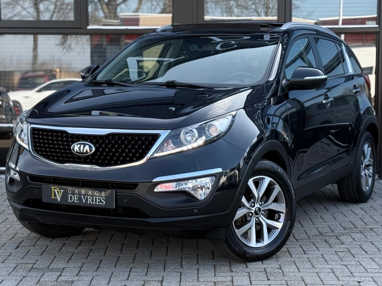 Kia Sportage - 1.6 GDI Dream Team Full Option Panoramadak Camera Garantie - AutoWereld.nl