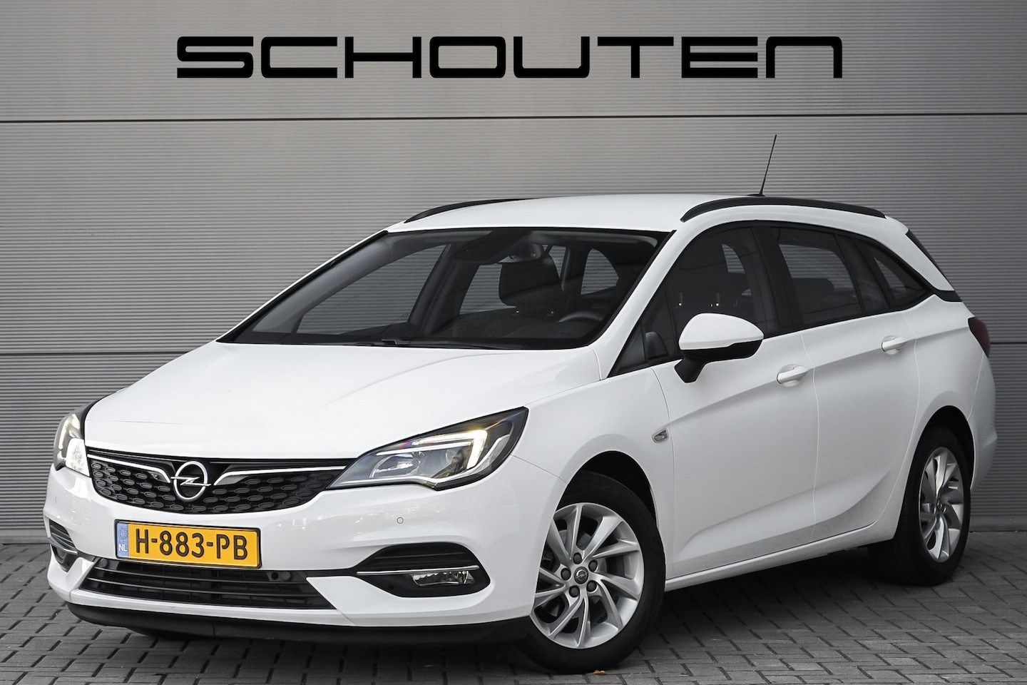 Opel Astra Sports Tourer - 1.2 Edition CarPlay AGR-Stoel Climate Camera - AutoWereld.nl