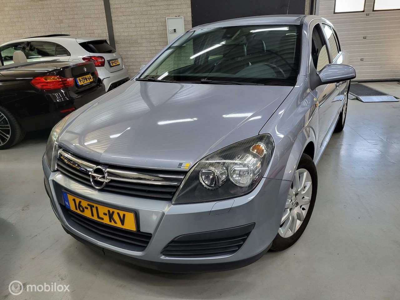 Opel Astra - 1.6 Business/Airco/Cruise/Navi/2e eigenaar/Nap! - AutoWereld.nl