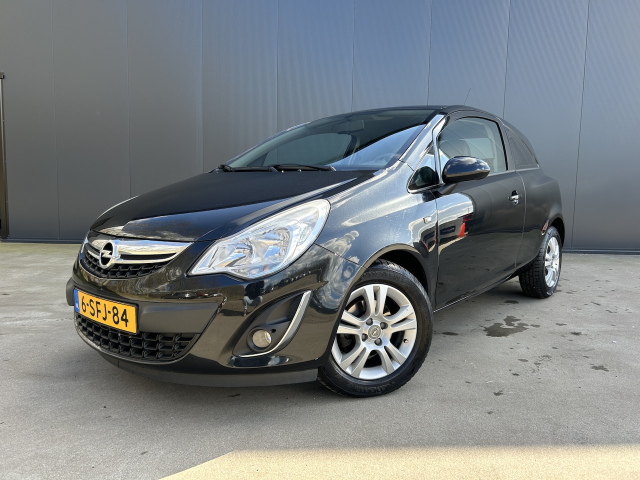 Opel Corsa - 1.2-16V Rhythm HALF LEER CRUISE AIRCO 3 DRS - AutoWereld.nl