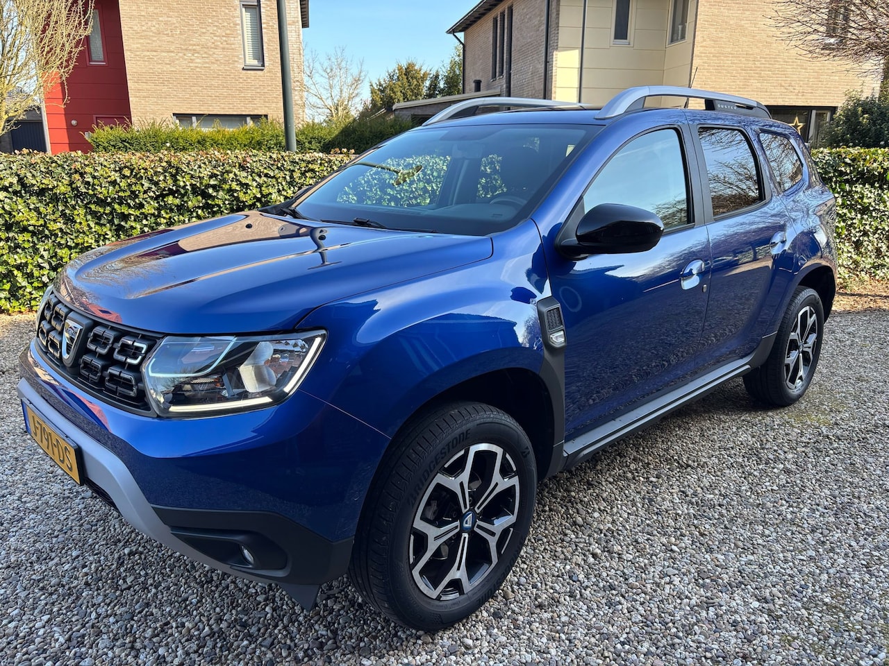 Dacia Duster - 1.0 TCe Bi-Fuel Serie Limitee 15th Anniversary 1.0 TCe Bi-Fuel Serie Limitee 15th Anniversary - AutoWereld.nl