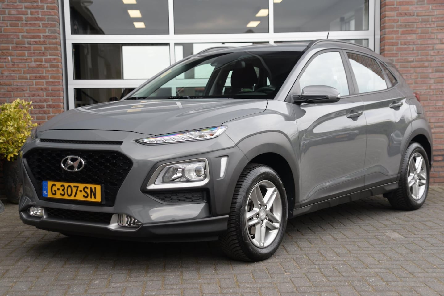 Hyundai Kona - 1.0 T-GDI Comfort | Carplay | Camera | Trekhaak | All Seasons | - AutoWereld.nl