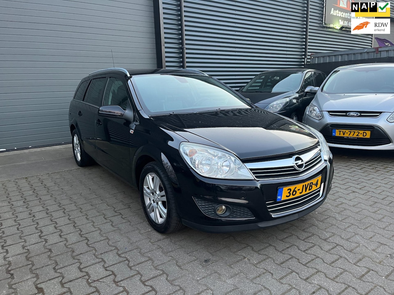 Opel Astra Wagon - 1.6 Cosmo LEER/TREKHAAK/STOELVERWARMING - AutoWereld.nl