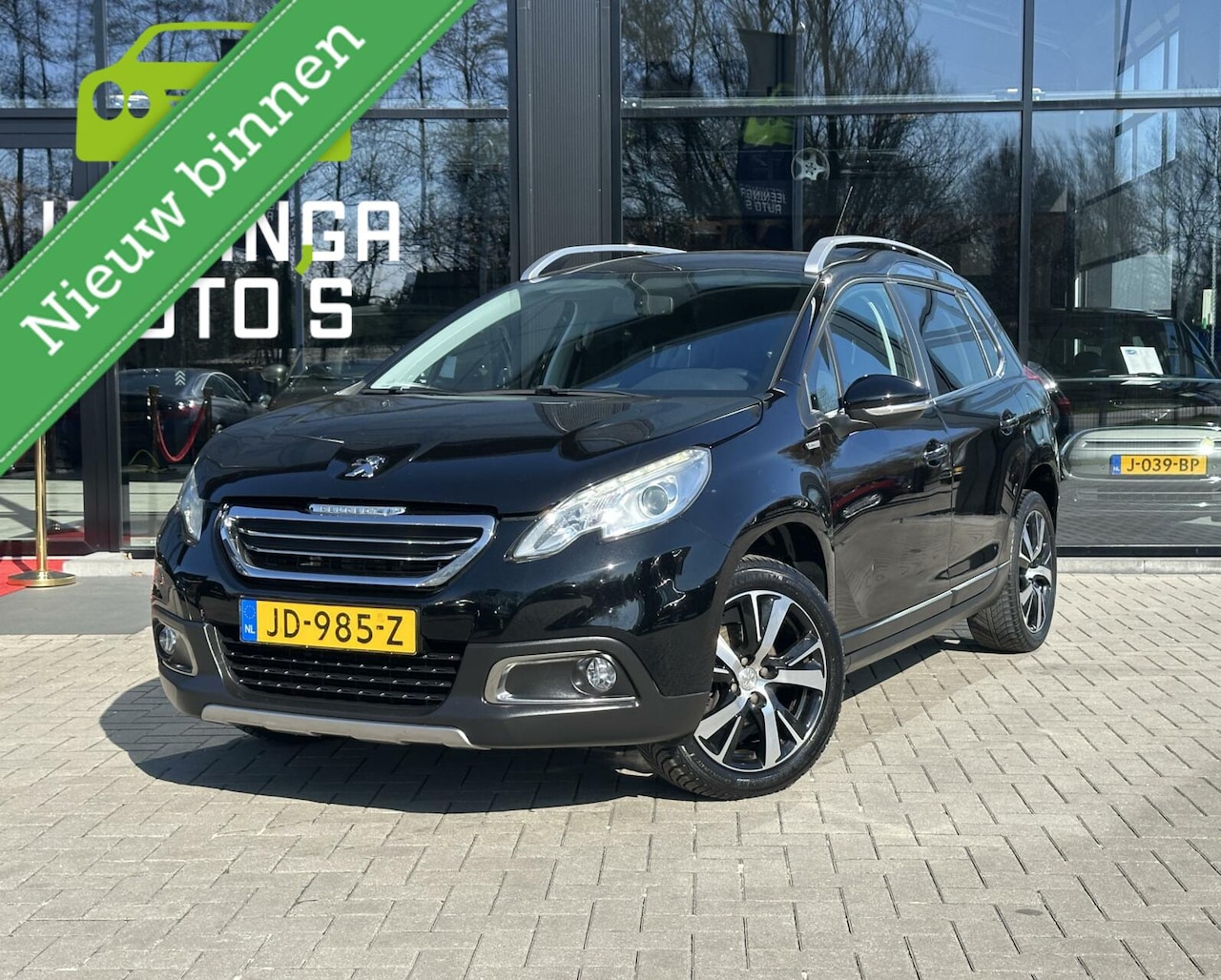 Peugeot 2008 - 1.2 PureTech Ubran Cross | Cruise | Trekhaak - AutoWereld.nl