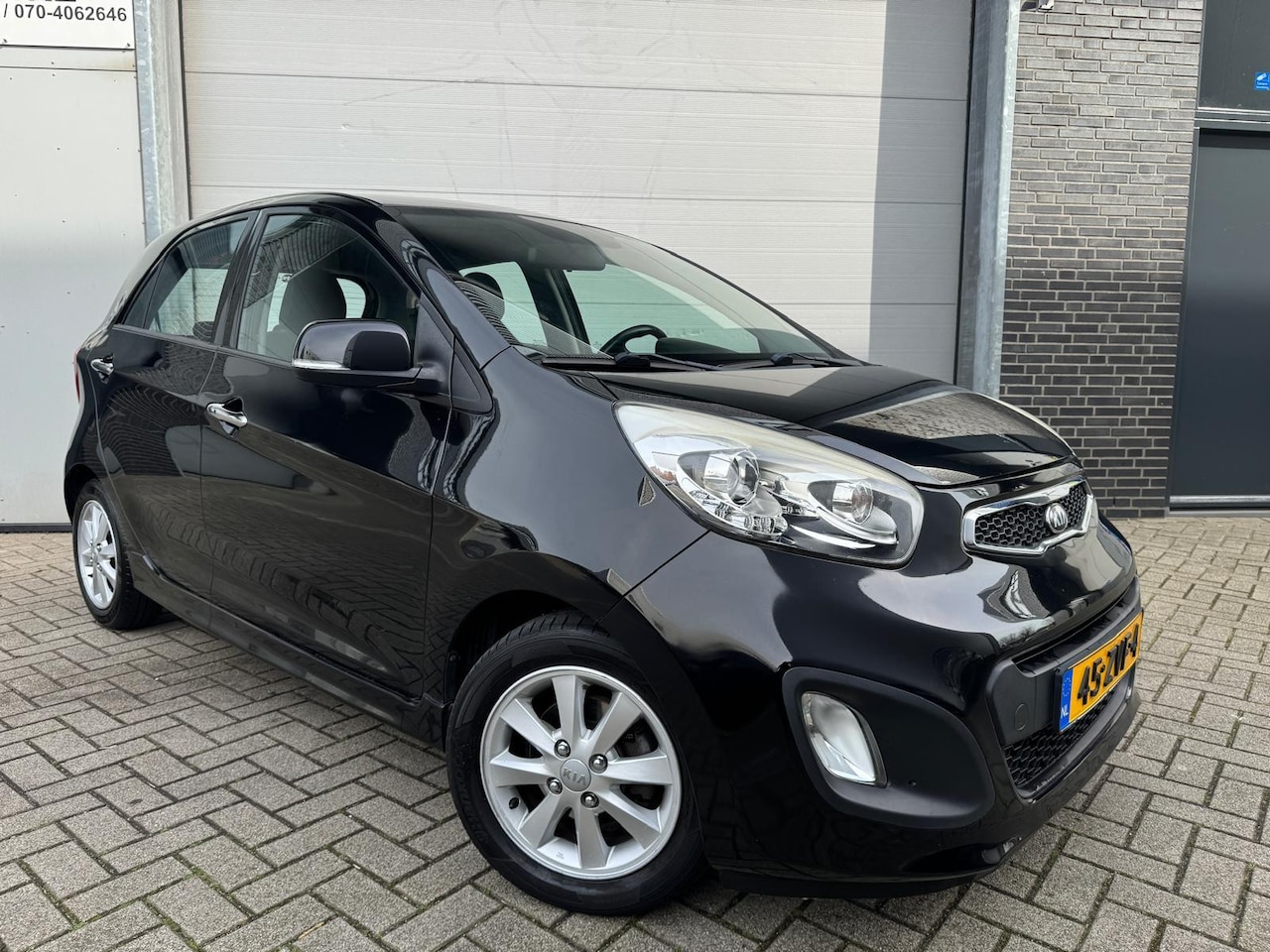 Kia Picanto - 1.2 CVVT ISG Super Pack [Keyless|Bluetooth|Clima|Buitenspiegels inklapbaar] - AutoWereld.nl