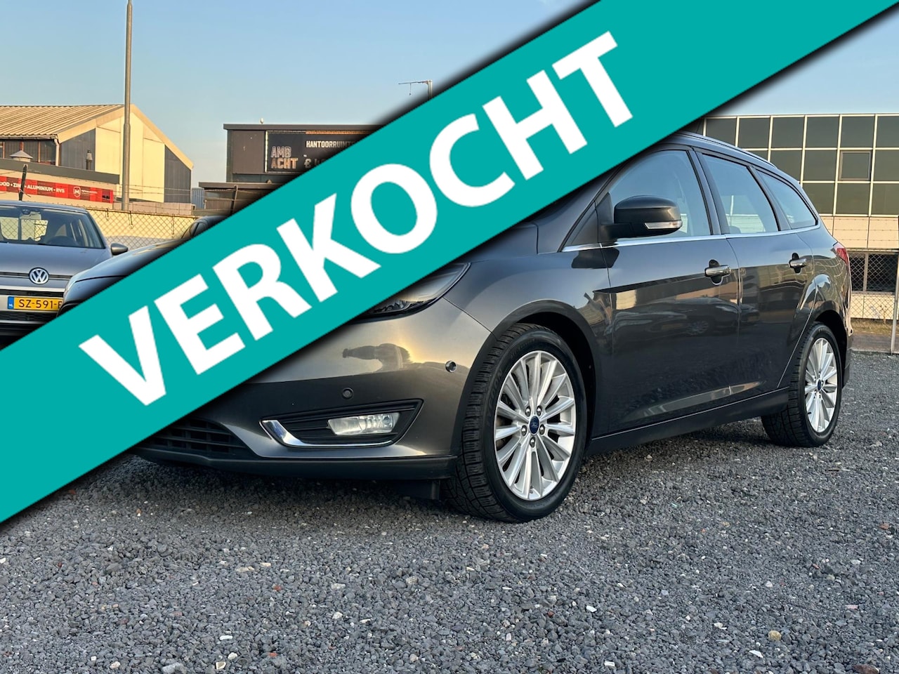 Ford Focus Wagon - 1.0 Titanium/NAVI/125 PK - AutoWereld.nl