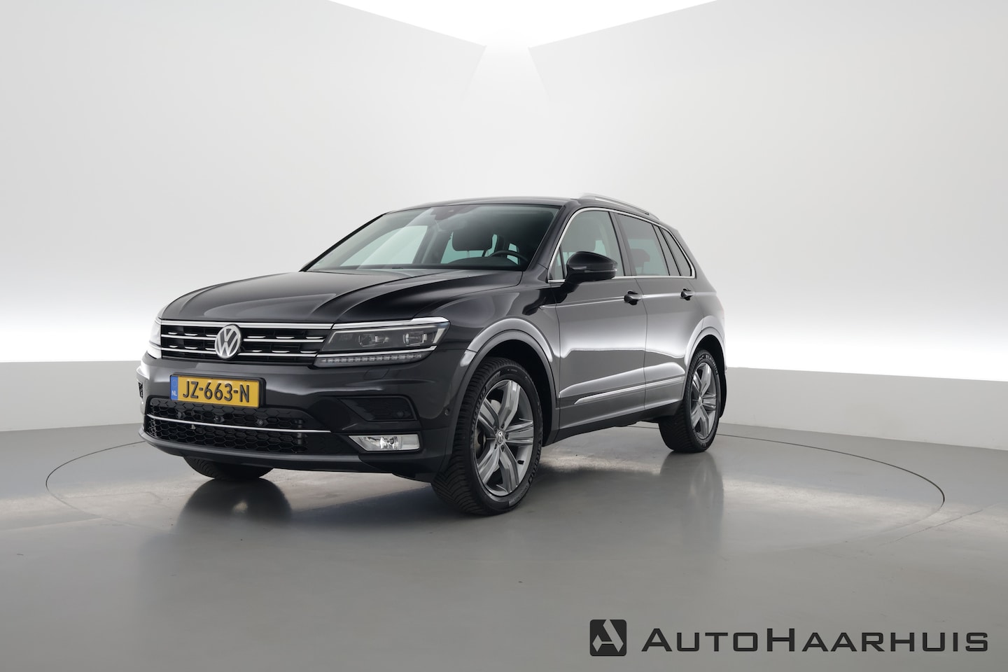 Volkswagen Tiguan - 2.0 TSI 4Motion Highline | HUD | 360cam | Elek. Trekhaak | Navi | Adapt. Cruise - AutoWereld.nl