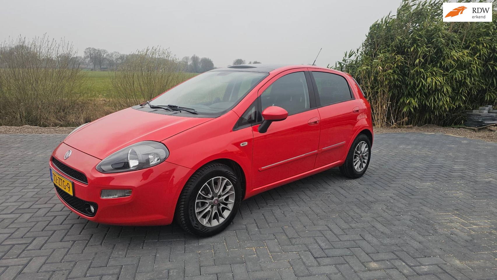 Fiat Punto Evo - 0.9 TwinAir Lounge PANORAMADAK! NAP - AutoWereld.nl