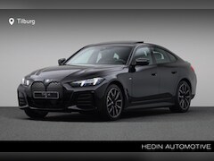 BMW i4 - eDrive40 Gran Coupé M Sportpakket Pro | Trekhaak \ Schuifdak | Innovation Pack | Comfort P