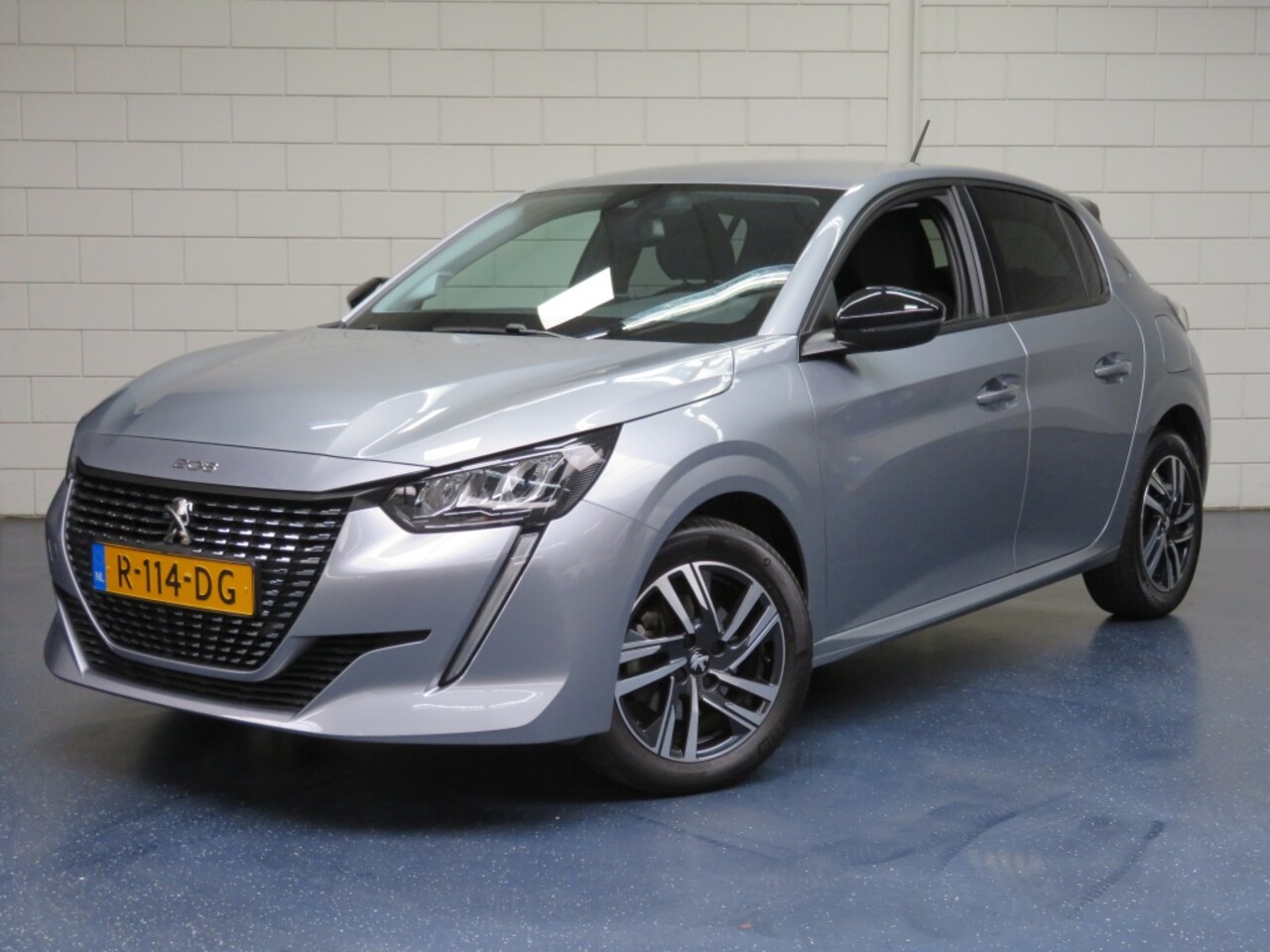 Peugeot 208 - 1.2 PT Allure Pack - AutoWereld.nl