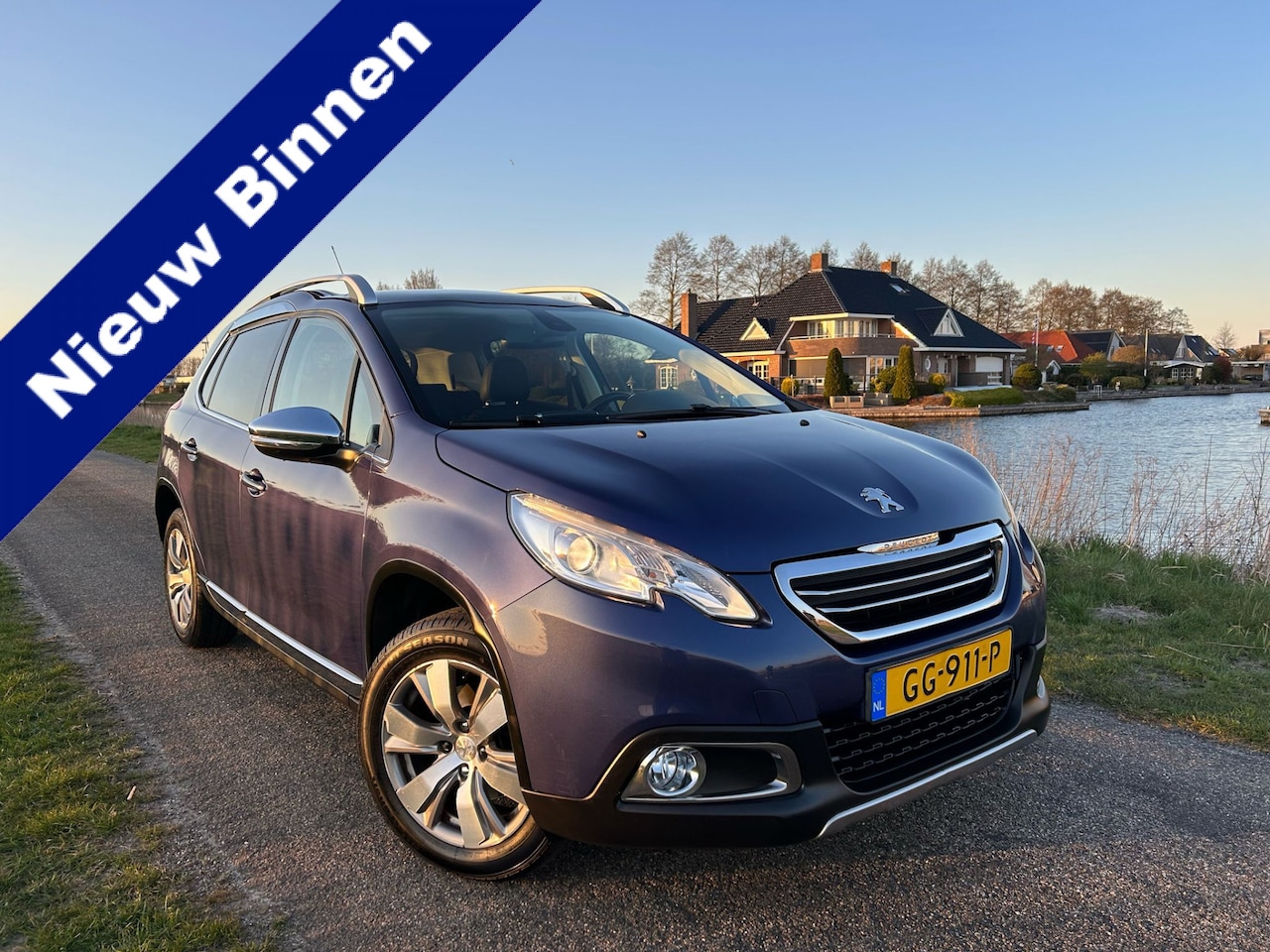 Peugeot 2008 - 1.2 PureTech Blue Lease Executive Clima / Cruise / Pano / Navi - AutoWereld.nl