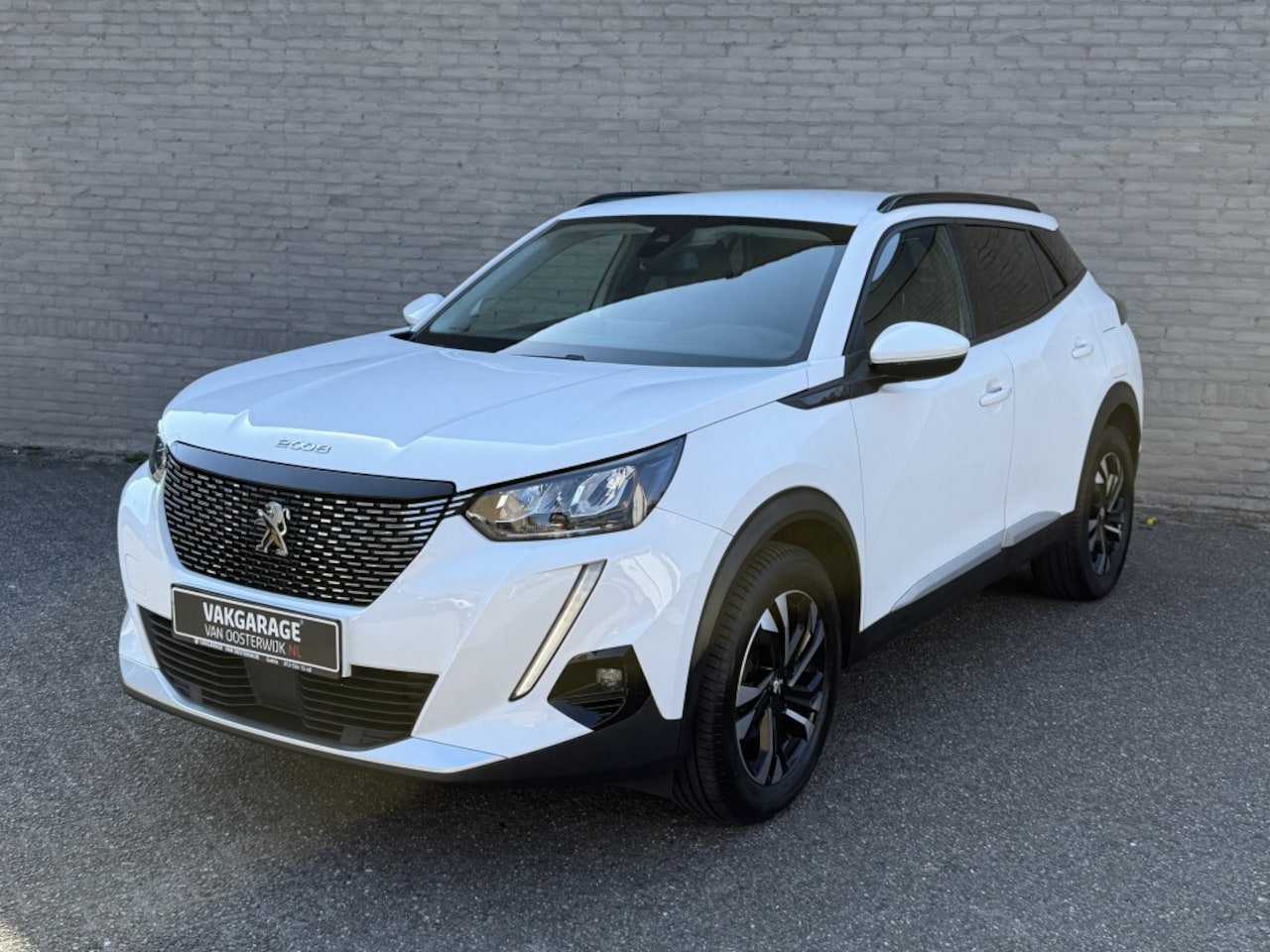 Peugeot 2008 - 1.2 PT Allure Pack - AutoWereld.nl