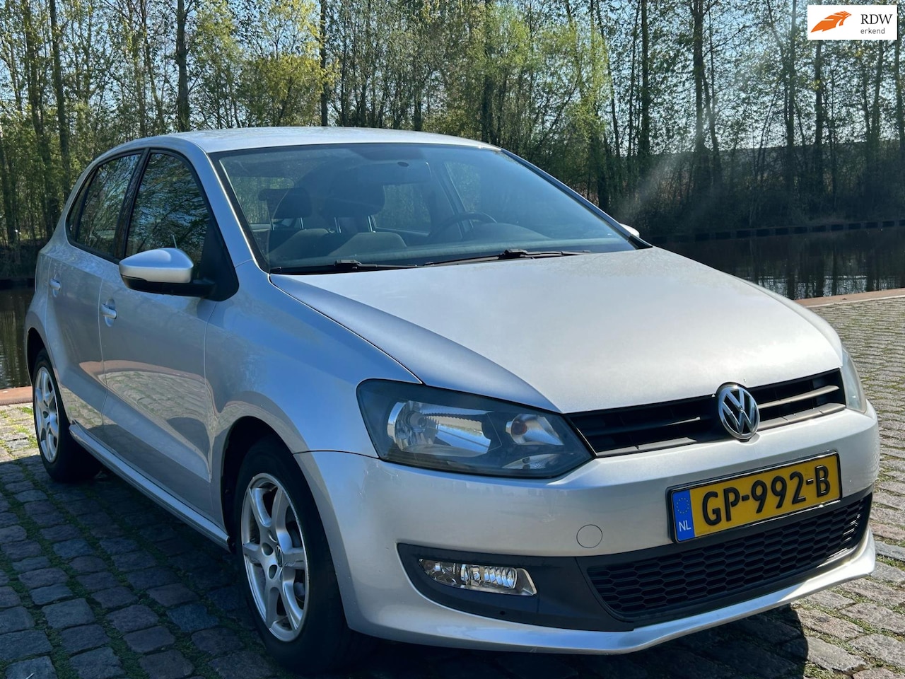 Volkswagen Polo - 1.2 TSI Highline airco navigatie cv op afs - AutoWereld.nl