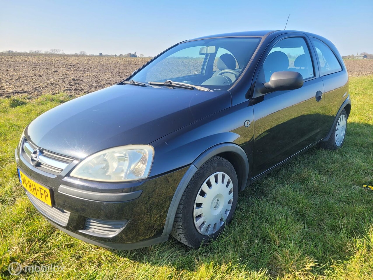 Opel Corsa - 1.2-16V Rhythm 1.2-16V Rhythm - AutoWereld.nl