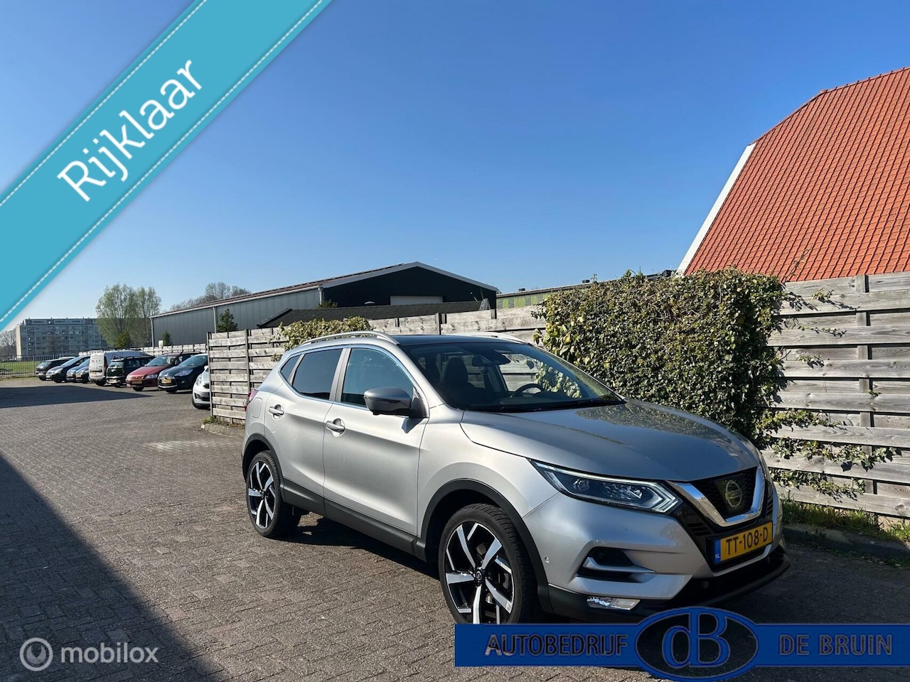 Nissan Qashqai - 1.2 Tekna + trekhaak panoramadak - AutoWereld.nl
